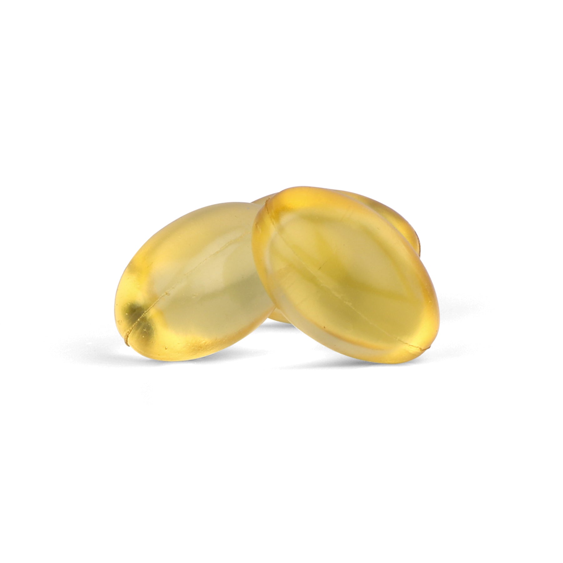 Close‑up of two golden omega‑3 softgel